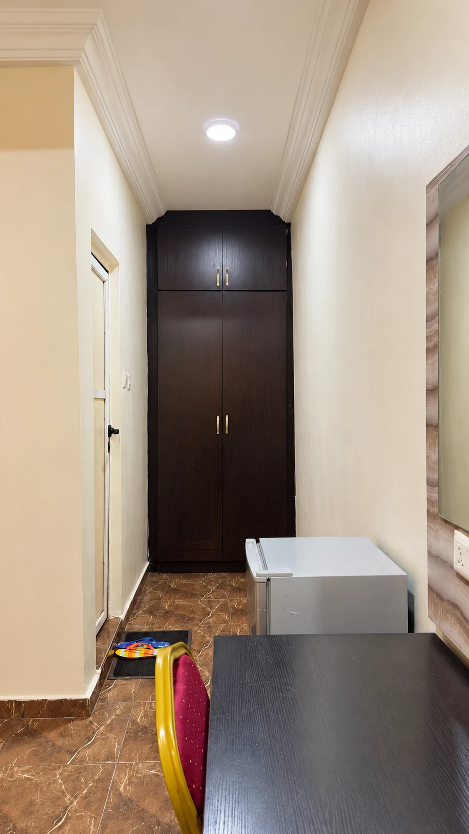 Executive Room wardrobe, desk and mini fridge area